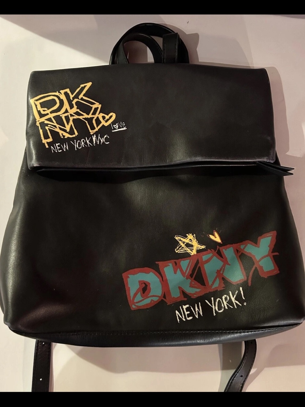 DKNY Black Backpack with Gold and Teal Graffiti Accents